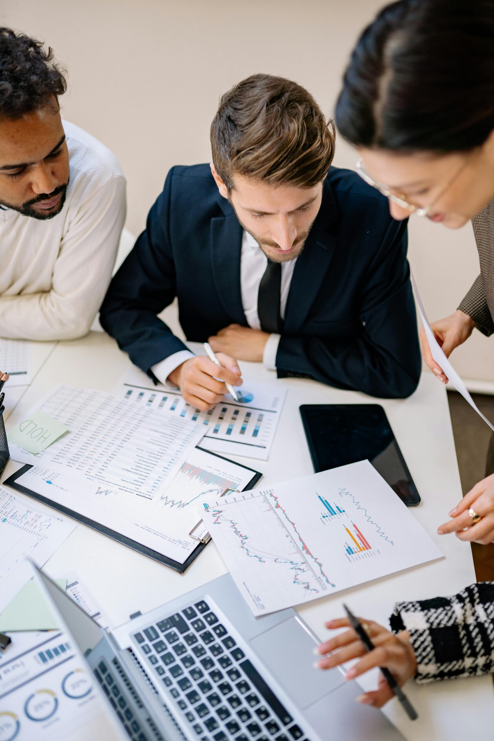 Founders reviewing hiring plans and performance data together